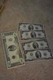 four 2 dollar bills from 1976, two with consecutive serial numbers