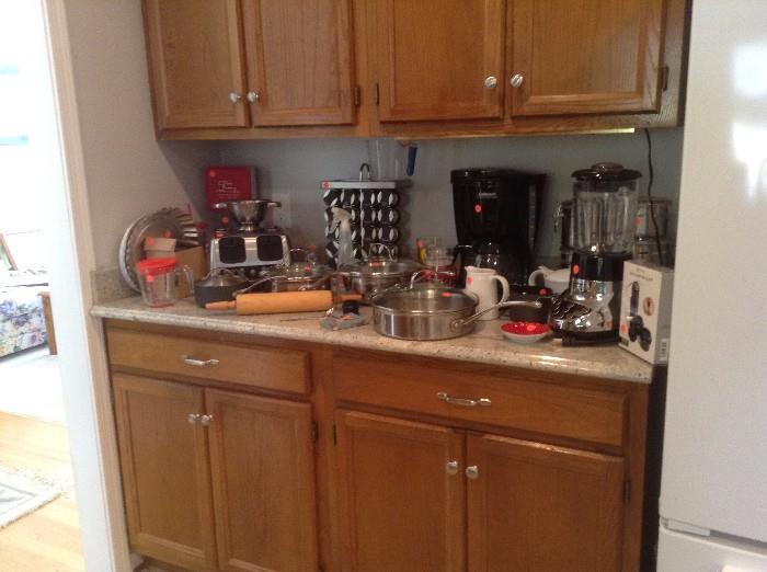 Kitchen. Cabinets are full too! Cuisinart, Calphalon, Pampered Chef items....