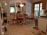 View of kitchen table and chairs.