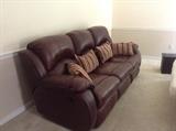 Brown leather reclining sofa