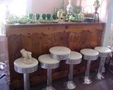 5 stools, green glass