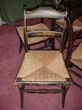 set of 4 Hitchcock chairs, gold stenciled back, rush seats, stretchers.