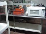 Stainless steel commercial work table with heat lamp