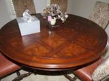 Custom made dining room table with 6 nail head leather bottom chairs