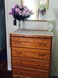dresser, lamp, mirror, flowers