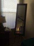 #37 full length mirror on metal stand $75 