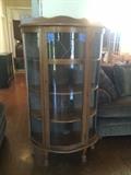 #14 curve front display cabinet w stain glass top $175