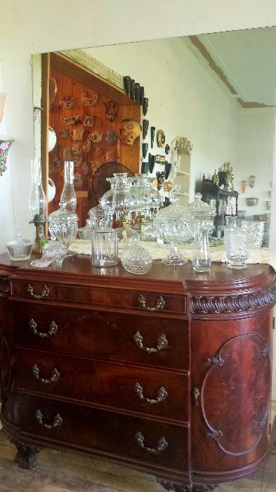 French flame mahogany dresser (would be a fabulous buffet). Circa 1920s. Fine glassware on top.