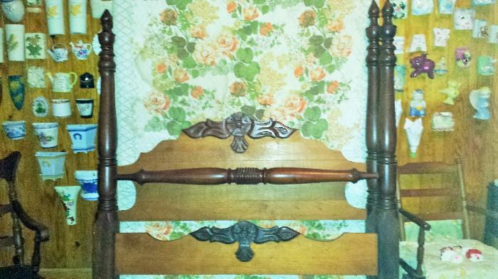 Antique 4 post full size bed. Various wall pockets.