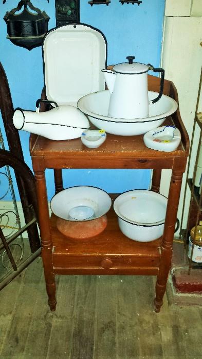 Primitive pine wash stand. Cast iron spittoon, black & white enamelware pans, bowls, chamber pot, urinal, ashtrays, coffee pot, & more!