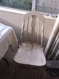 Vintage wood chair. This goes with a table and additional chairs. It is very "rustic"