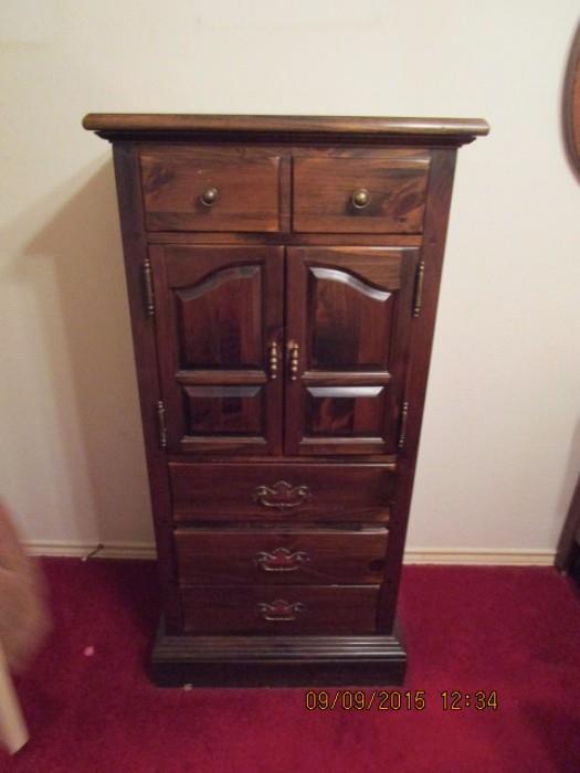 JEWELRY CABINET WITH MIRROR.  TOP RAISES TO REVEAL SECTIONS AND MIRROR.