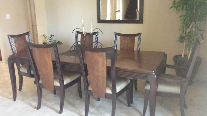 Formal dining set with 6 chairs. Beautiful leaf design in chair backs. $ 900.00