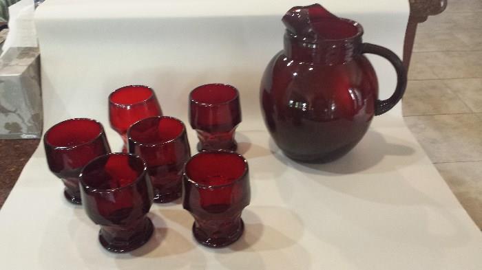 Rare red glass pitcher and 6 glasses. 