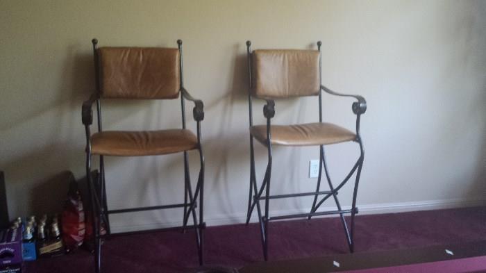 4 of these leather bar stools available. $35.00 each or all 4 for $100.00