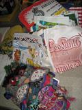 Tea towels and vintage Chinese children's hats, suitable for framing.