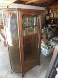 nice antique oak bow glass china cabinet