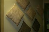 Chocolate and beige pillows.