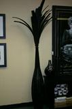 Black basket like floor vase