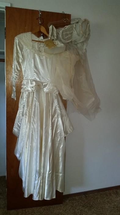 Vintage wedding dress, satin w/ train, veil, and purse.  So cool.  Clean it and it's ready for your wedding!!