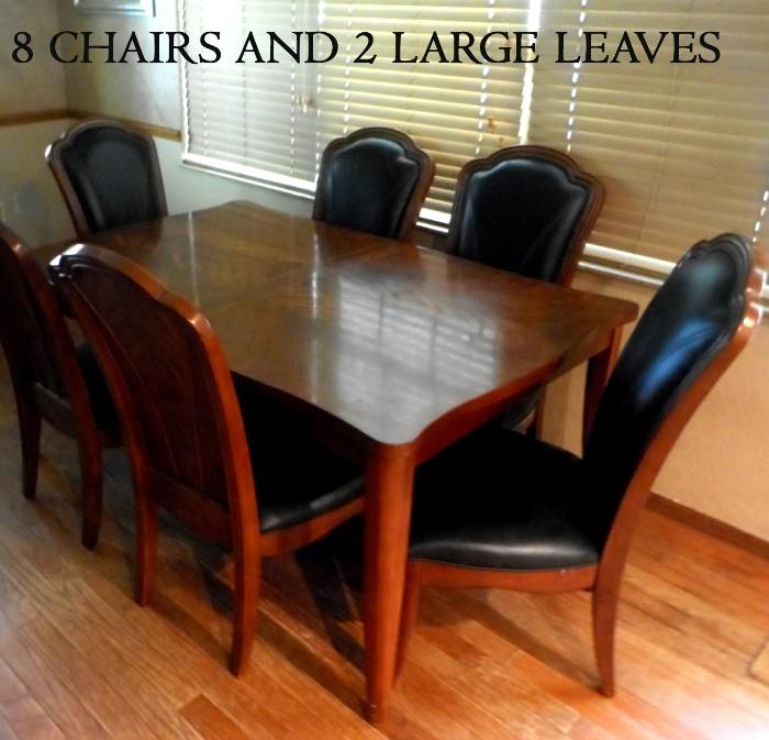 Very Impressive Dinette set including 8 Chairs and 2 Large Leaves 
