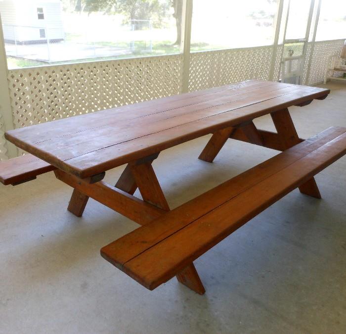 Large Solid Wood Picnic Table in very good condition, has been kept on the porch