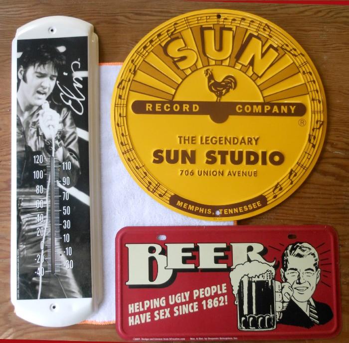 A few of the Cute Metal Signs available along with an Elvis Thermometer 