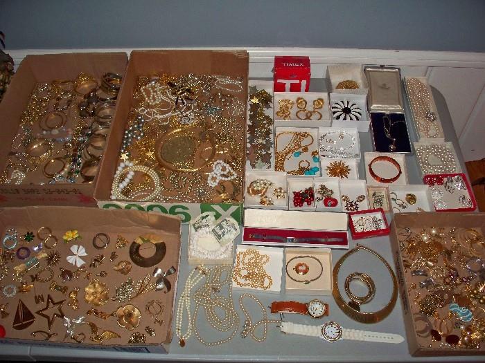 Lots of Jewelry, Earrings, Brooches, Necklaces, and Bracelets.