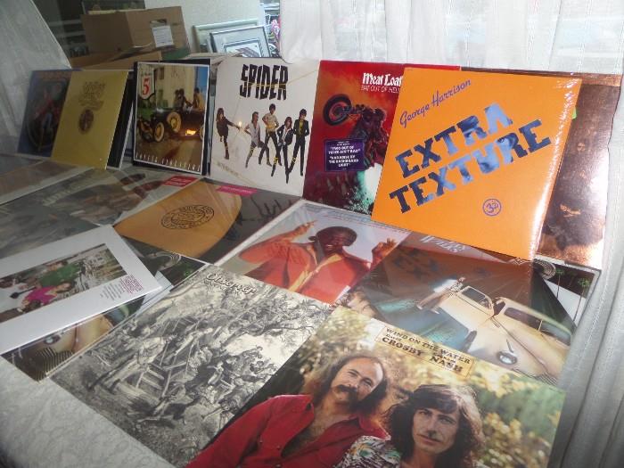 Unopened still sealed record albums , George Harrison, ZZTop,Spider, Jackson FIve, just to name a few