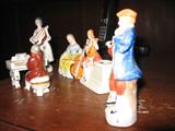Occupied Japan Figurines (7) Piano, Piano Player, Flute Player, Mandolin Player, Cello Player, & Guitar Player.