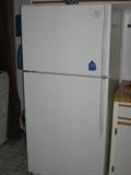Whirlpool refrigerator/freezer with ice maker. 66 inches high, 30 inches wide, 31 inches deep, 18 ft.³