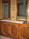 dresser with six drawers and two mirrors