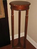 Wood plant stand. 42 inches tall, 14 uses across.