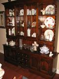 Two piece pine china cabinet. Top has two glass doors, and two drawers. Bottom has four doors, three drawers. 74 inches long, 81 inches tall, 16 inches deep.