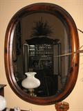 Antique wall mirror. Perfect condition with no cracks or splits. 41 inches tall by 33 inches wide.
