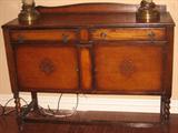 Antique sideboard with barley twist legs, two doors into drawers. 48 inches long, 36 inches tall, 17 inches deep