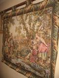 Wall tapestry showing colonial fishing scene. 60 inches long, 51 inches tall.