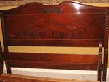 Matching mahogany headboard and foot board, full-size.