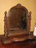 Small mid-century Maple vanity mirror. 24 inches long, 24 inches high, 9 inches deep.