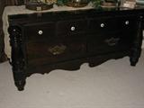 Dark stained pine belt chest. 51 inches long, 25 inches tall, 20 inches deep