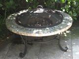 Outside fire pit (some damage on tile)