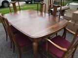 Gorgeous dining room table. Three extension and eight chairs.