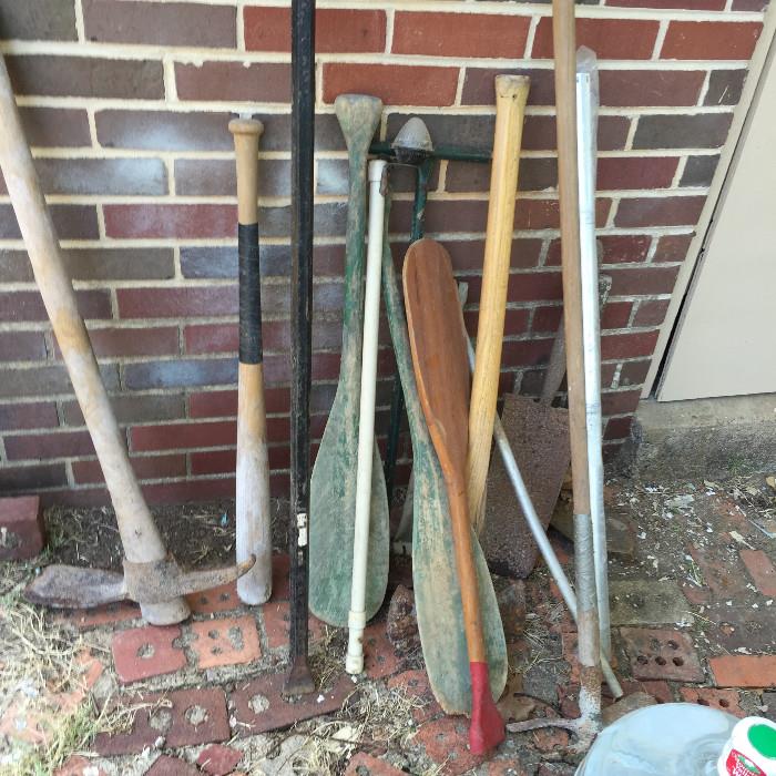 baseball bats, wood oars ,picks, tools