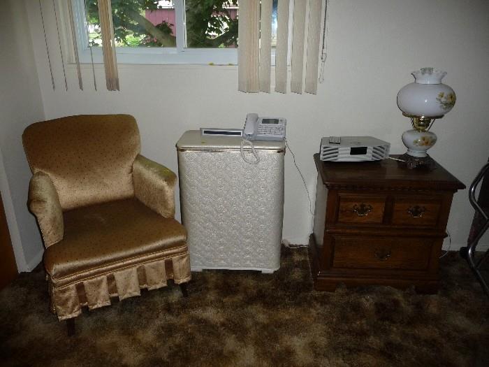 clean Chair , clothes hamper , Bose radio , small chest