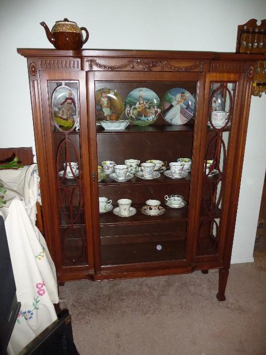 china cabinet - nice size , cup and saucer collection 