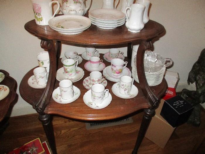 TWO TIERED TABLE AND CUP AND SAUCER COLLECTION