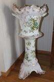 Tall unmarked porcelain planter and stand.
