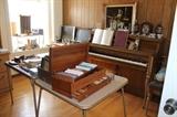 Wooden compendium of card games, rummicub and poker chips (like new). Wurlitzer upright piano, great for beginner. Three small flat screen TVs.