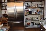 KitchenAid stainless steel refrigerator, Cuisinart appliances and other brands.