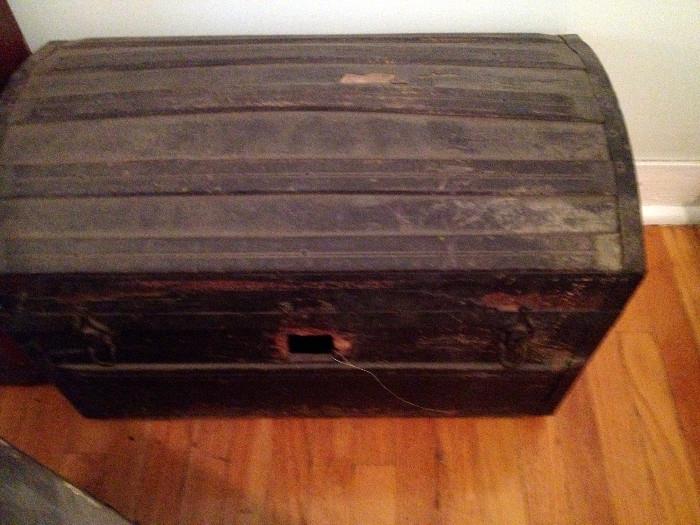 Hump or domed trunk with wood frame